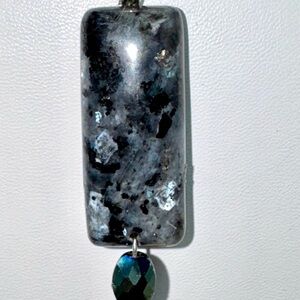 Larvakite!  This rare stone comes from the the Larva region of Norway.